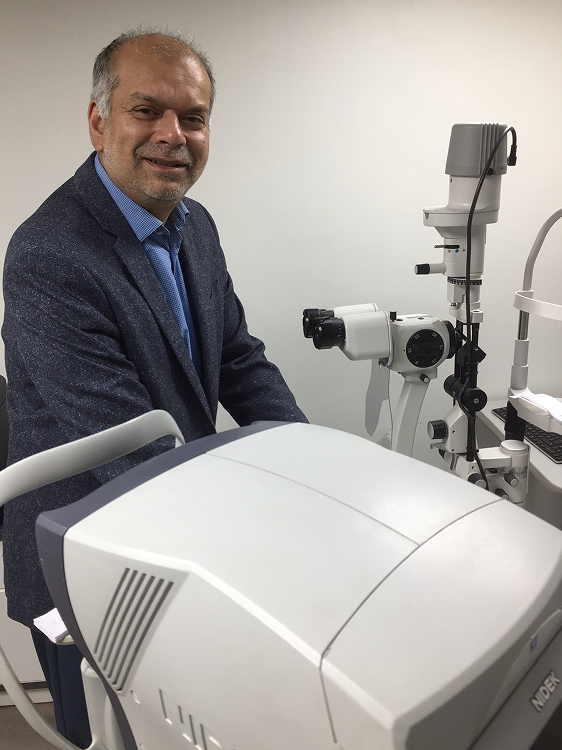 Abbas Jaffer, founder of Family Eyecare, with diagnostic equipment